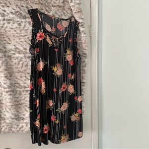 Black floral polyester dress.
